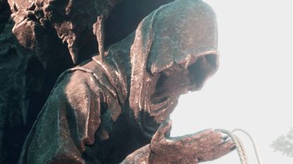 A stone statue holds a rope on which you can find the Mortal Shell 2 Mushroom Village key.