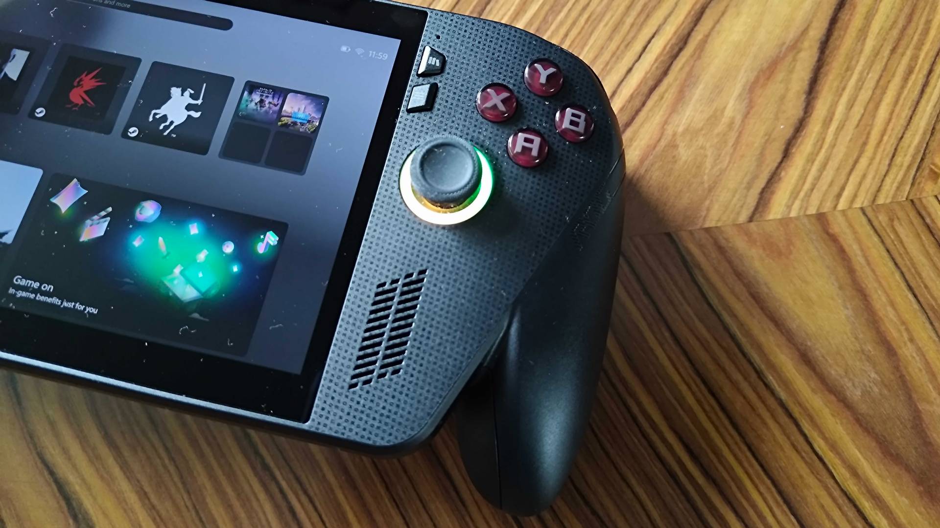 Right side of ROG Xbox Ally X with face buttons and right thumb stick in view.