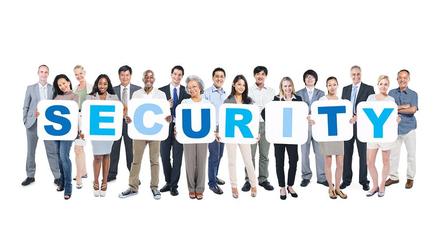 People holding Security sign