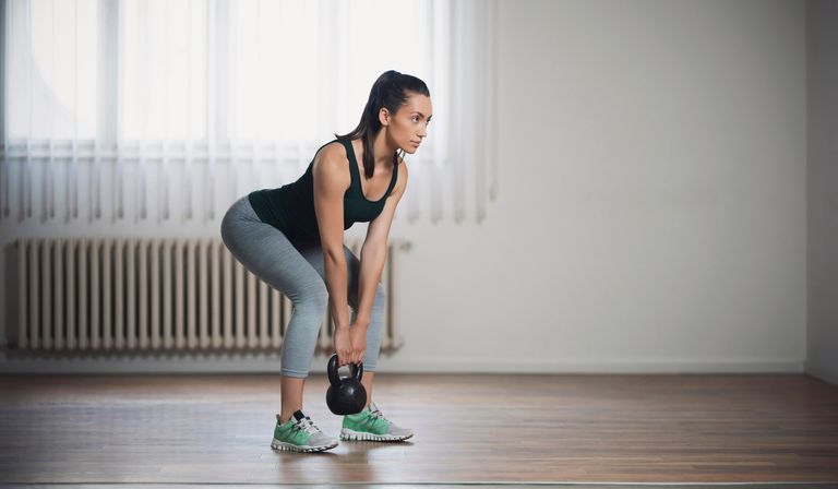Deadlift with dumbbells and kettlebells at home