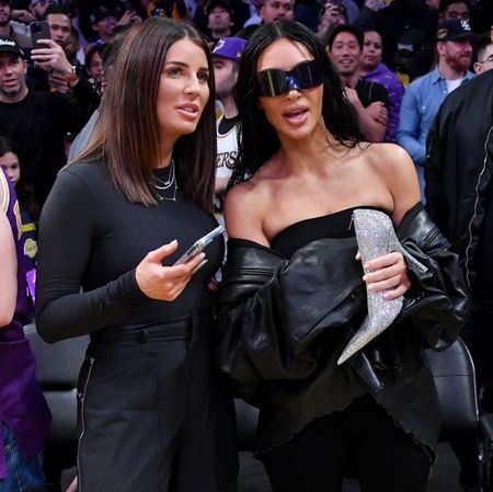 Getty Images in a Balenciaga outfit and carrying a crystal heel clutch