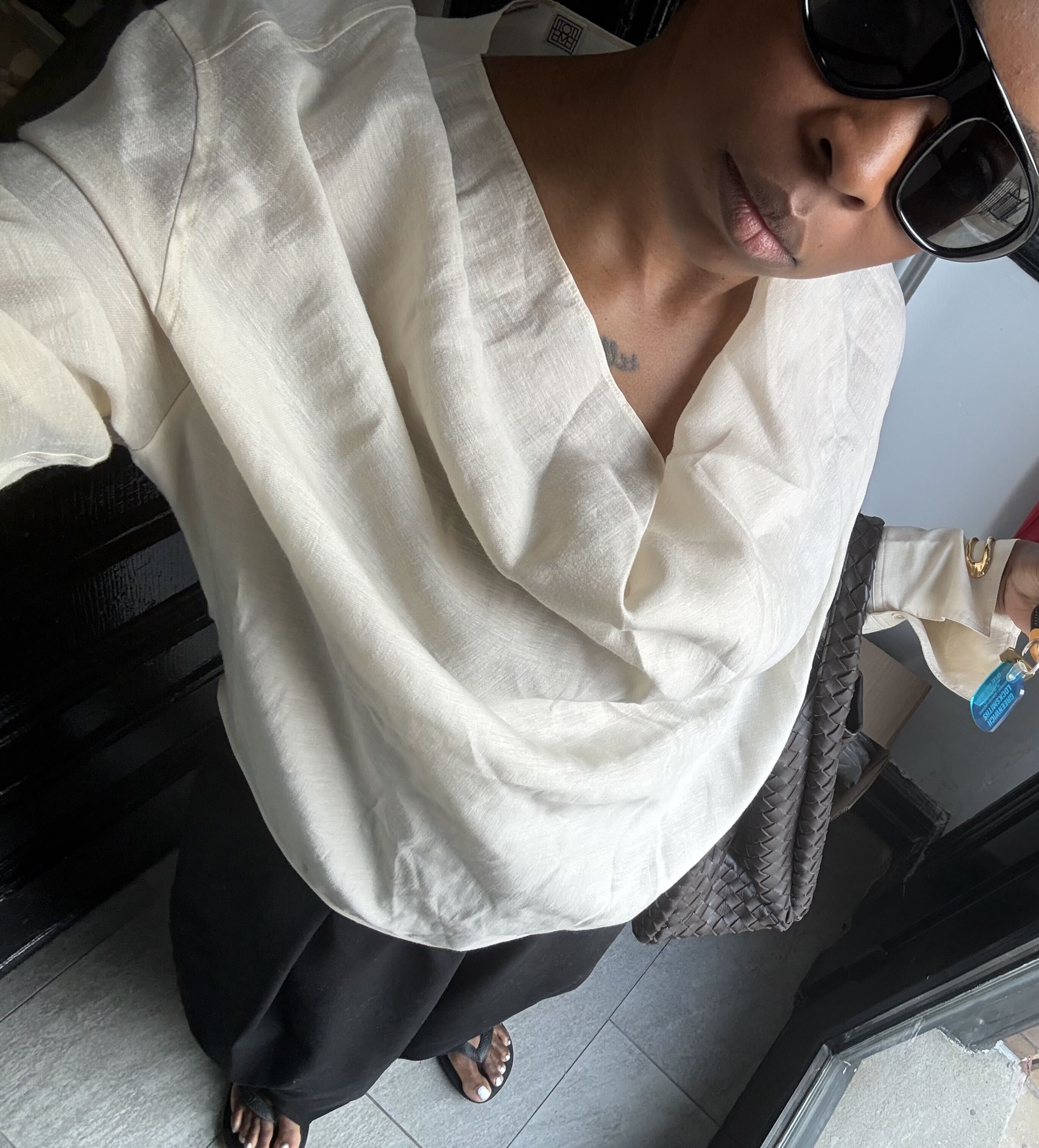 black woman wearing neutral fall outfits