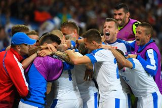 Slovakia players celebrate a goal against Russia at Euro 2016.