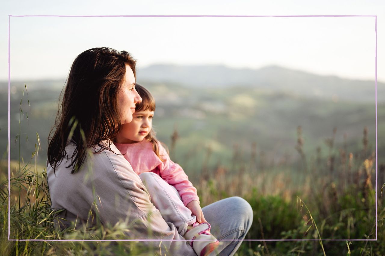 Mother and daughter in a field