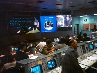 The Mission Operations Control Room in the Mission Control Center at the conclusion of the Apollo 11 lunar landing mission.