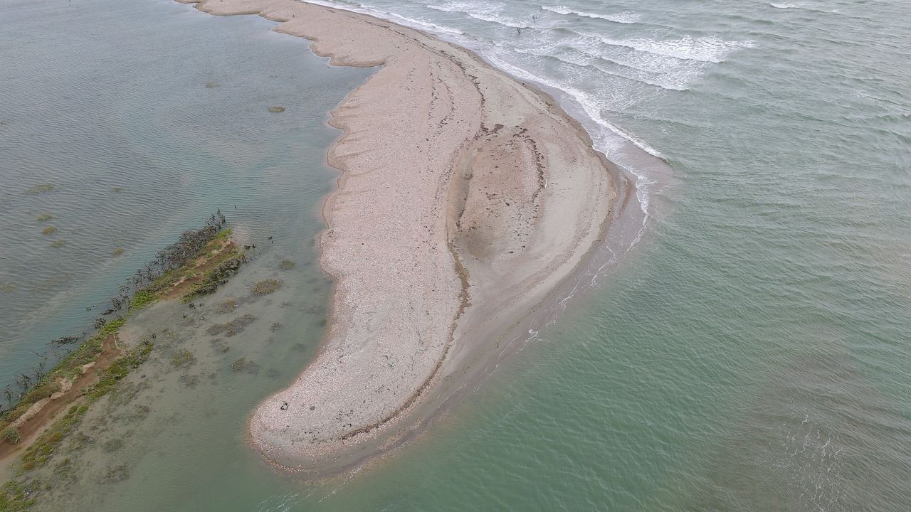 Aerial views of the South Coast of the UK on a cloudy day from a drone