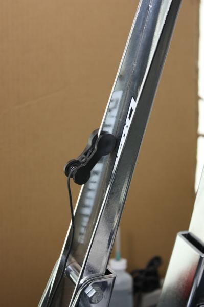 This acoustic pickup lets builders audibly measure the evenness of spoke tension throughout each wheel.