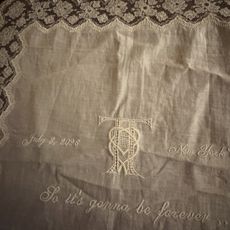 Maren Morris shares a souvenir from Taylor Swift and Travis Kelce's wedding, which is a white embroidered doily napkin featuring lyrics from Blank Space