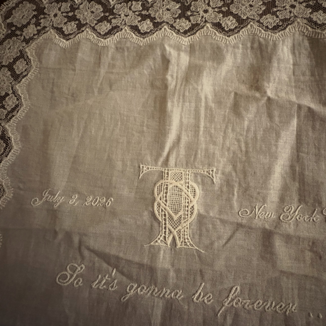 Maren Morris shares a souvenir from Taylor Swift and Travis Kelce's wedding, which is a white embroidered doily napkin featuring lyrics from Blank Space