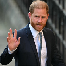 Britain's Prince Harry, Duke of Sussex waves as he arrives at the the Royal Courts of Justice, Britain's High Court, in central London, on April 8, 2025.