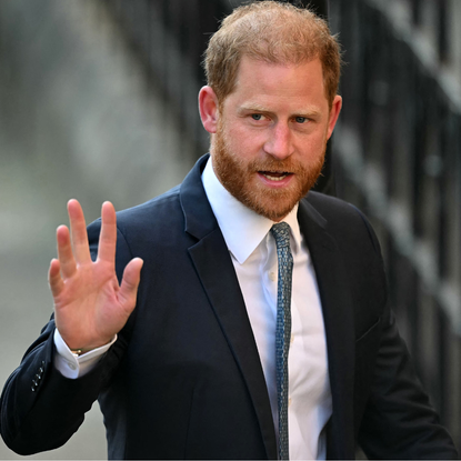 Britain's Prince Harry, Duke of Sussex waves as he arrives at the the Royal Courts of Justice, Britain's High Court, in central London, on April 8, 2025.