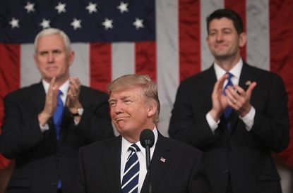 Trump pauses for applause during his address to Congress.