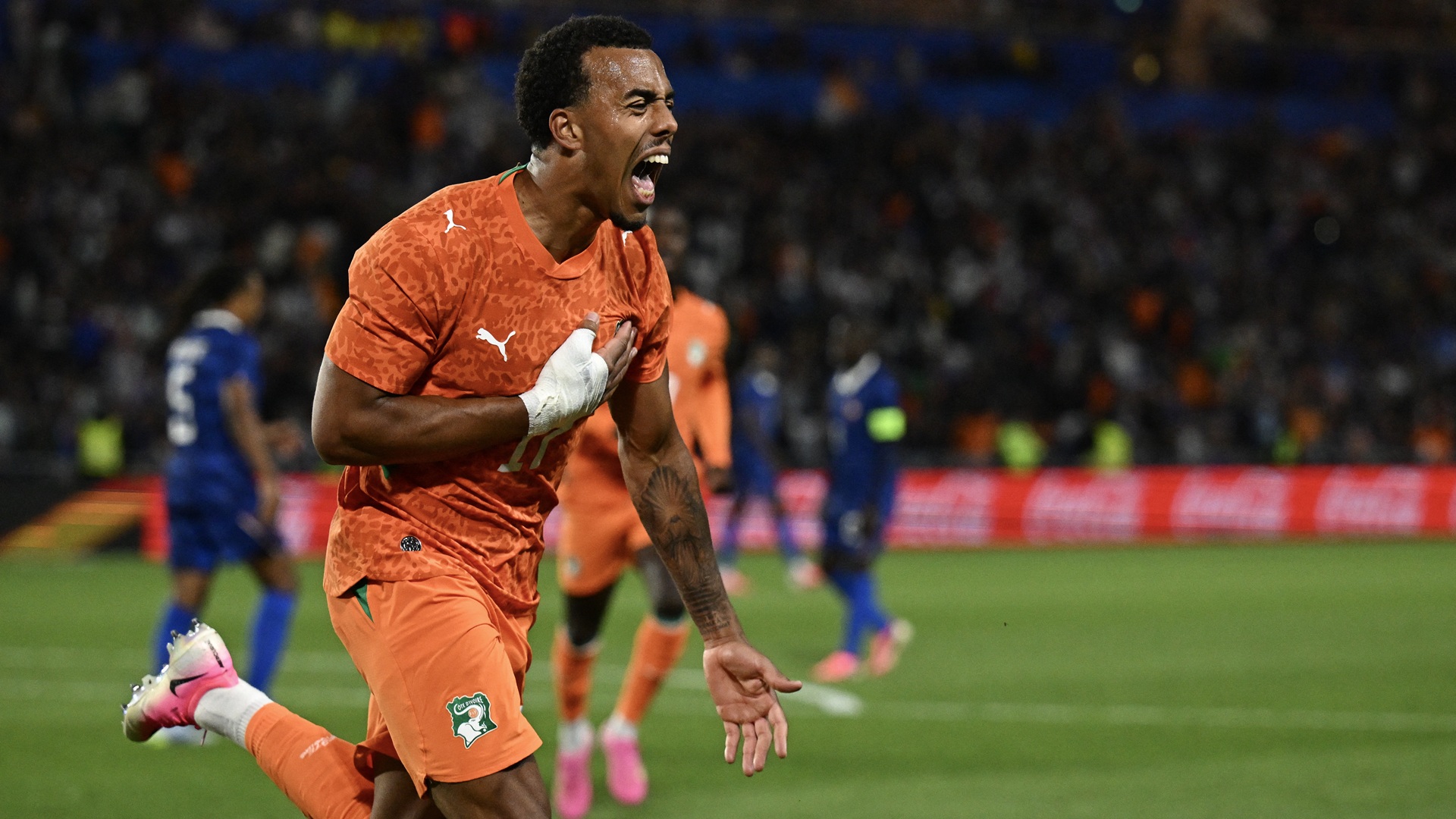 Ivory Coast's defender #17 Guela Doue celebrates scoring the equalizing goal during the international friendly football match between France and Ivory Coast ahead of the 2026 FIFA World Cup football tournament at the Stade de la Beaujoire in Nantes, western France, on June 4, 2026. (Photo by Loic VENANCE / AFP via Getty Images)