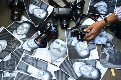 Pictures of murdered Mexican journalists.