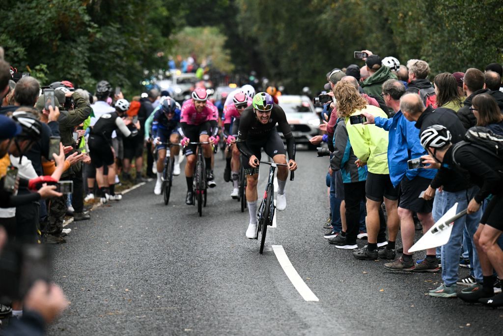 Cyclists compete as they cycle over "Jawbone Hill" during the third stage from Sheffield to Barnsley of the Tour of Britain cycling race, near Oughtibridge, northern England, on September 5, 2024. (Photo by Oli SCARFF / AFP)