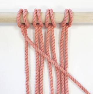How to macrame a diagonal clove hitch knot step one