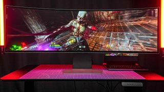 Samsung Odyssey G9 OLED sitting on desk