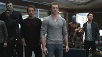 Hulk, Rhodey, Tony Stark, Steve Rogers, Nebula, Rocket and Scott Lang standing together in Avengers: Endgame