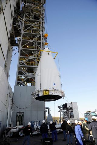 DMSP-19 Satellite Hoisted