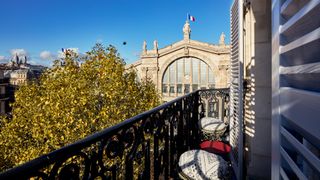 Room with a balcony and views over Gare du Nord at 25hours Hotel Terminus Nord in Paris