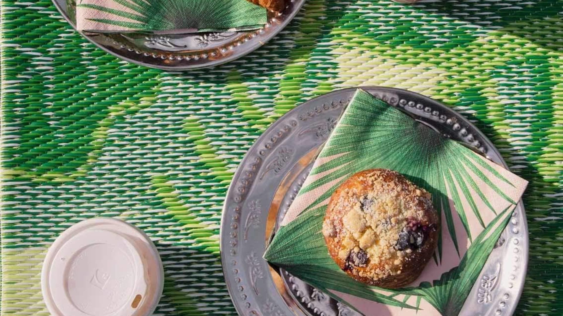 Amazon Outdoor Rug with coffee and a muffin on