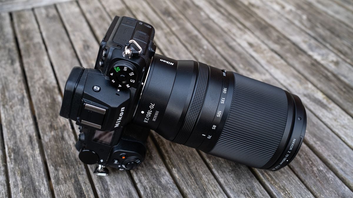 Nikkor Z 70-180mm f/2.8 attached to a Nikon Z 7II on a wooden outdoor table