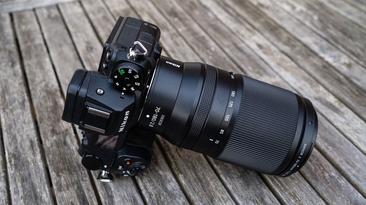 Nikkor Z 70-180mm f/2.8 attached to a Nikon Z 7II on a wooden outdoor table