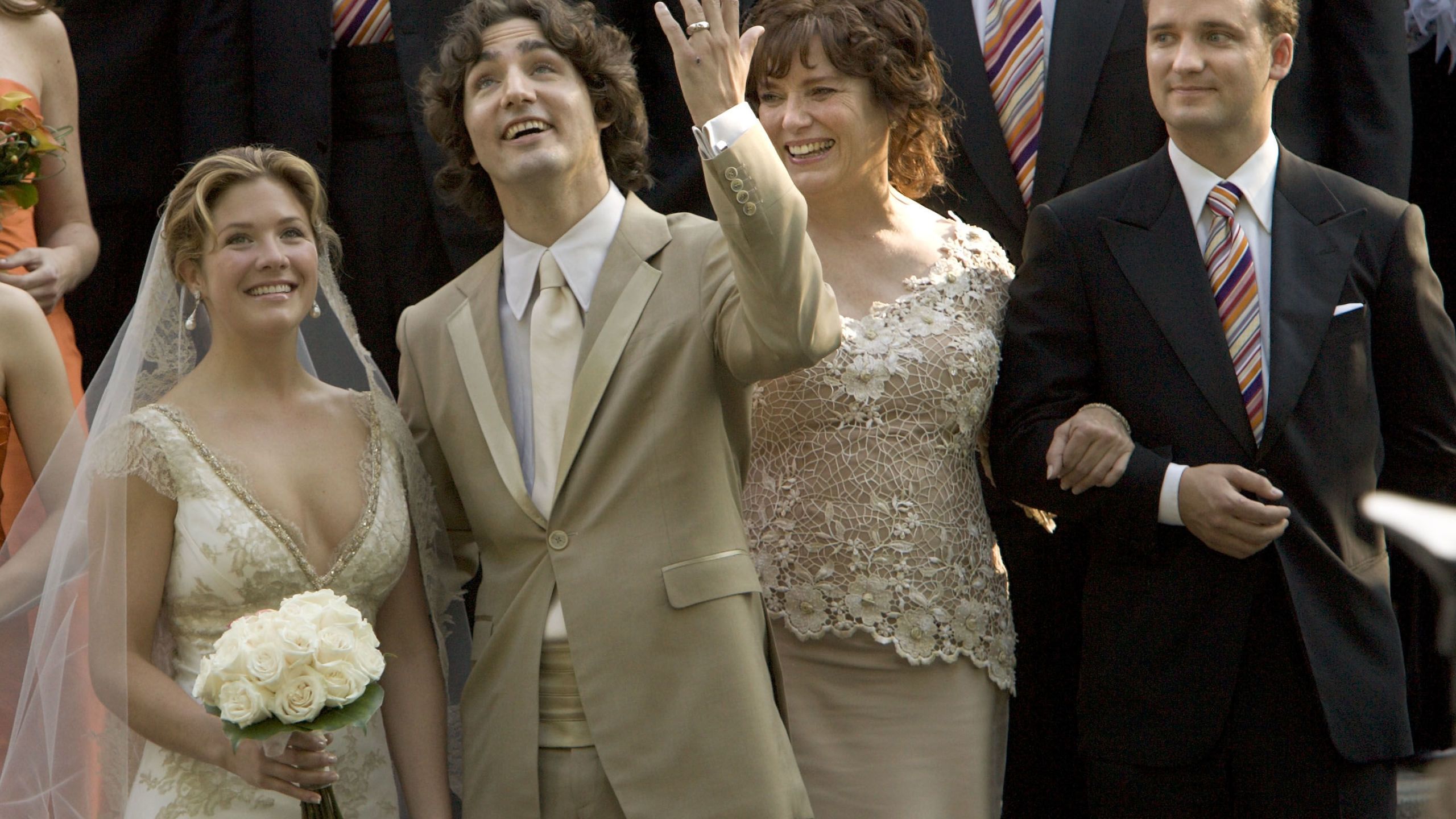 Facial expression, Suit, Ceremony, Event, Wedding dress, Formal wear, Gown, Marriage, Wedding, Bridal clothing,