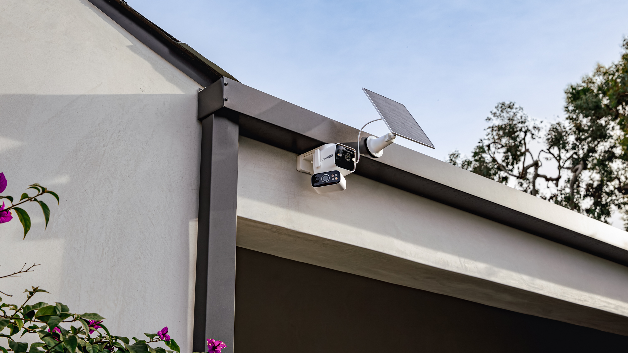 TP-Link Tapo C675D security camera mounted to a house