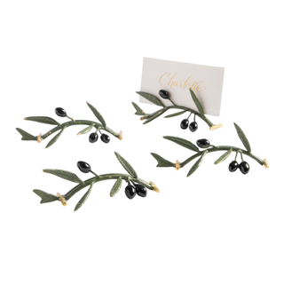 set of four place card holders that resemble olive branches