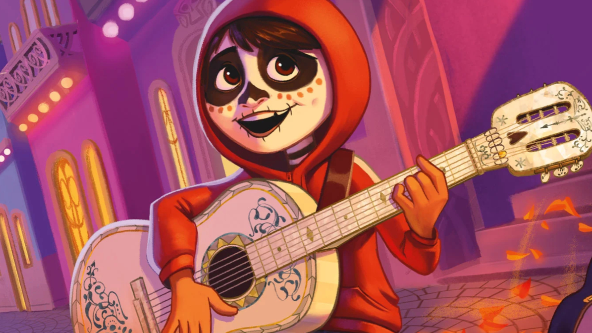 Miguel plays on a guitar on the streets while singing and smiling