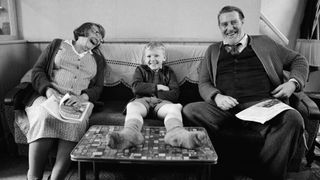 (L-R) Judi Dench as Granny, Jude Hill as Buddy and Ciarán Hinds as Pop in "Belfast"