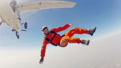 A skydiver takes a dangerous plunge.