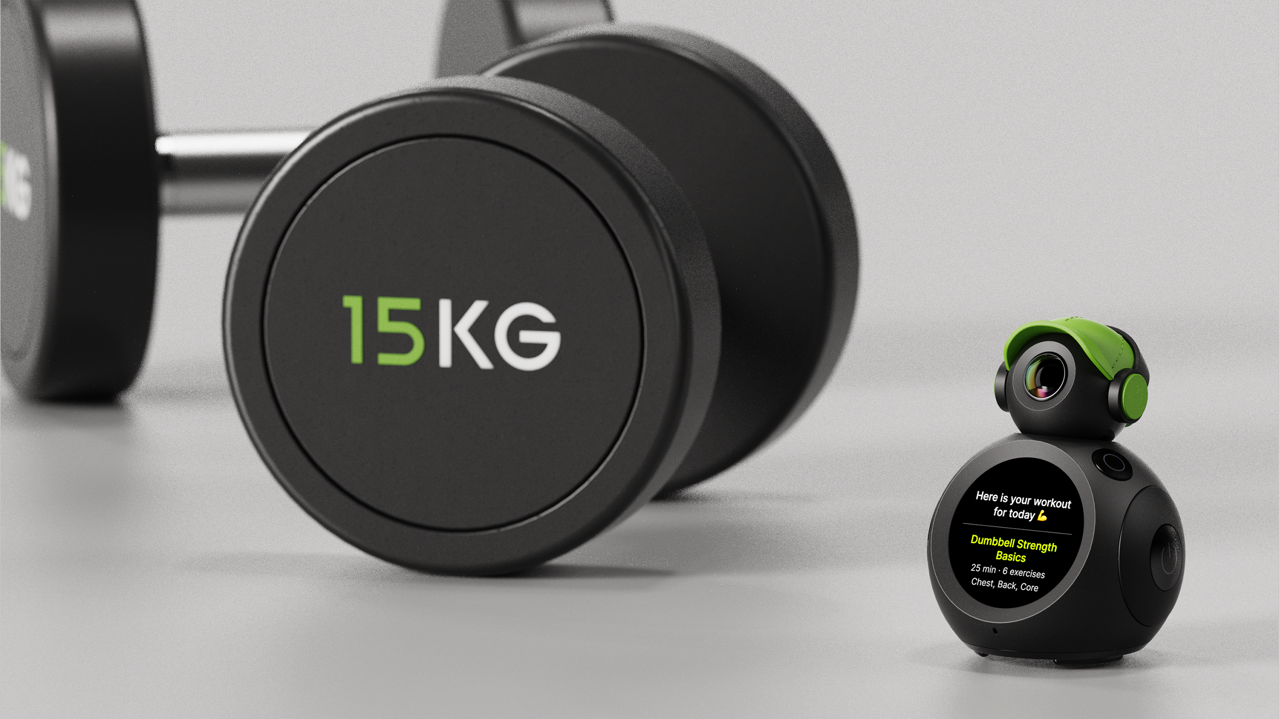 Camera mounted on top of a circular screen, next to a dumbbell with 15kg written on it