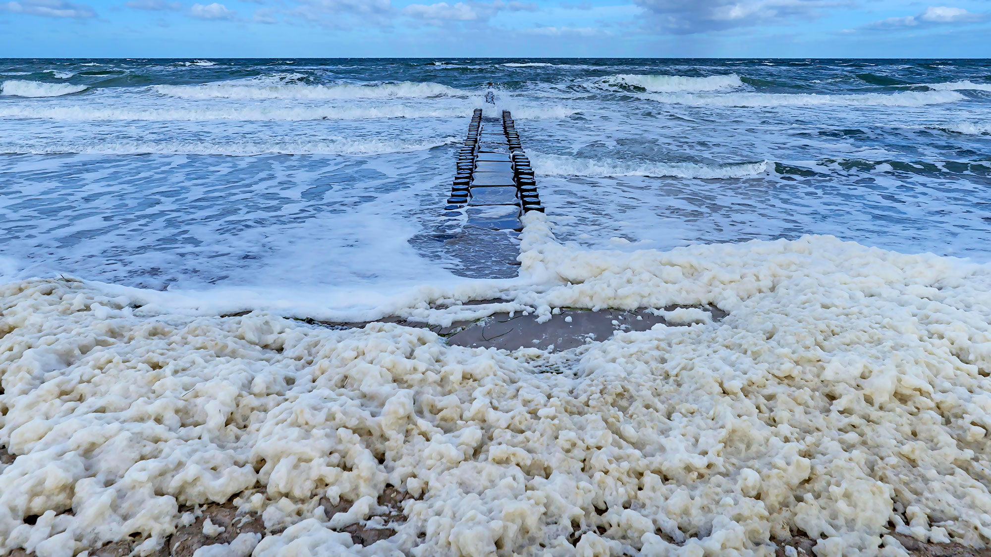 Gobs of sea-foam wash up in Spanish town. Here's why.