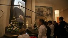 Parts of the brain of St. John Bosco are kept in glass behind the altar at the basilica of Castelnuovo, near Turin, Italy.
