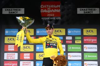 CHASTREIXSANCY FRANCE JUNE 07 Wout Van Aert of Belgium and Team Jumbo Visma celebrates at podium as Yellow Leader Jersey winner during the 74th Criterium du Dauphine 2022 Stage 3 a 169km stage from SaintPaulien to ChastreixSancy 1391m WorldTour Dauphin on June 07 2022 in ChastreixSancy France Photo by Dario BelingheriGetty Images