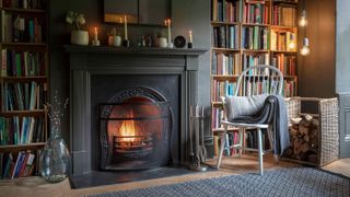 cast iron fireplace in cosy living room