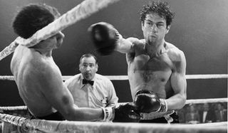 Raging Bull Robert DeNiro punches someone out in the ring