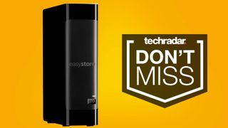 black WD external hard drive against yellow background