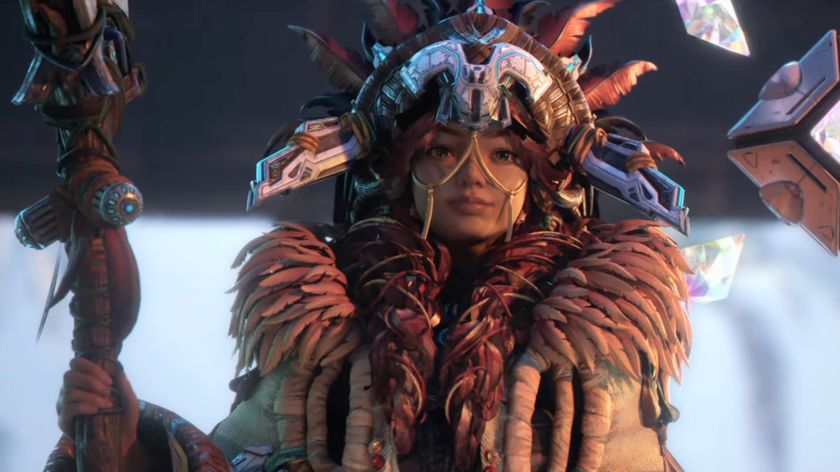 Light of Motiram extended trailer still - woman in tribal headgear holding a staff