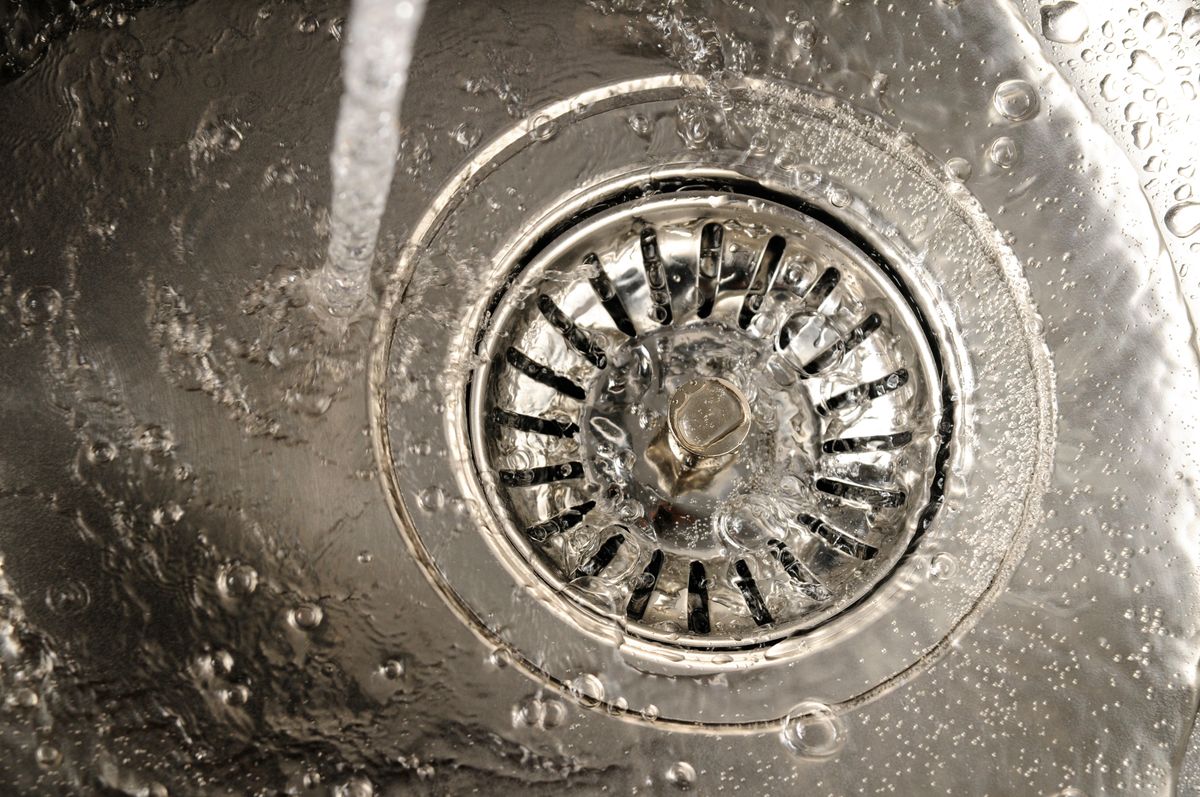 change a kitchen sink drain