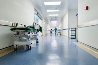 A hospital corridor. 