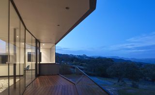 The cantilevered terrace pushes the house outwards into the valley and allows residents to make the most of the open views and natural surroundings