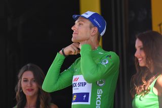 Marcel Kittel putting on the green jersey after stage 15 of the Tour de France