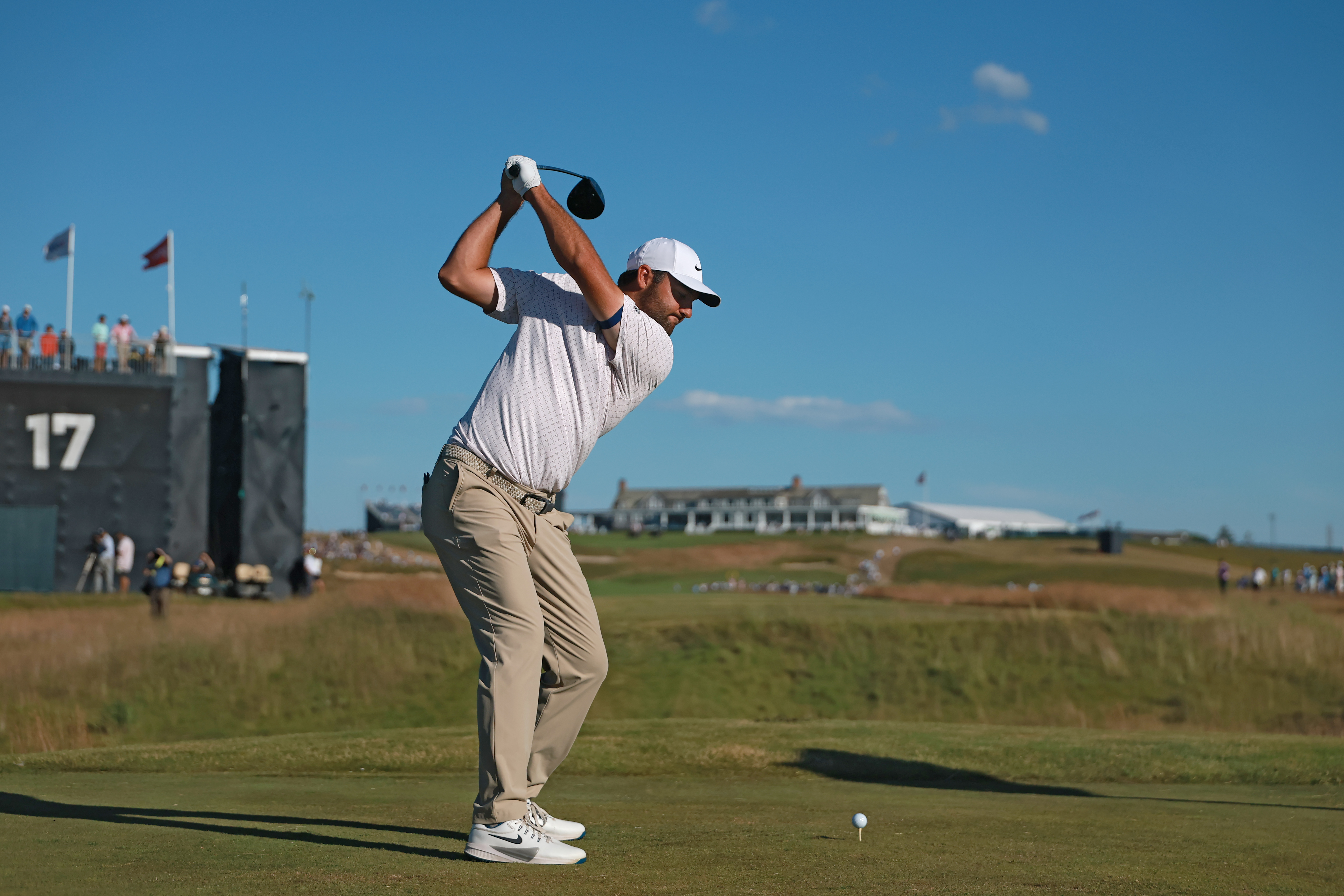 Scottie Scheffler of the United States plays his shot from the 18th tee during the third round of the 126th U.S. OPEN at Shinnecock Hills Golf Club (Photo by Andrew Redington/Getty Images)