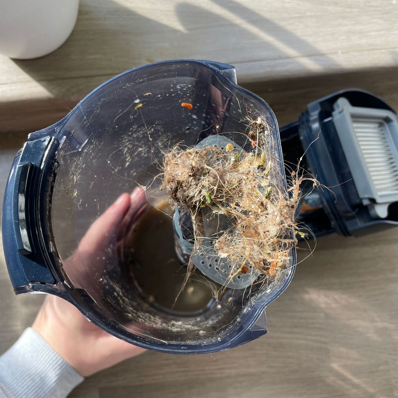 Tineco Smart Mop dirty water tank full of dirty water and clumps of hair