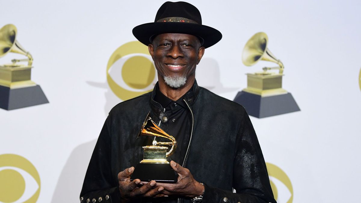 US musician Keb&#039; Mo&#039; poses in the press room with the award for Best Americana Album for &quot;Oklahoma&quot; during the 62nd Annual Grammy Awards on January 26, 2020, in Los Angeles.