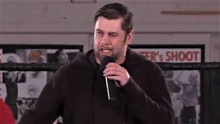 Jimmy Rave on the mic in CZW ring