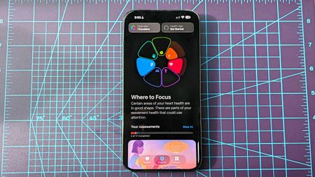 Photo of an iPhone 16 Plus showing the new Health app with longevity assessment tools